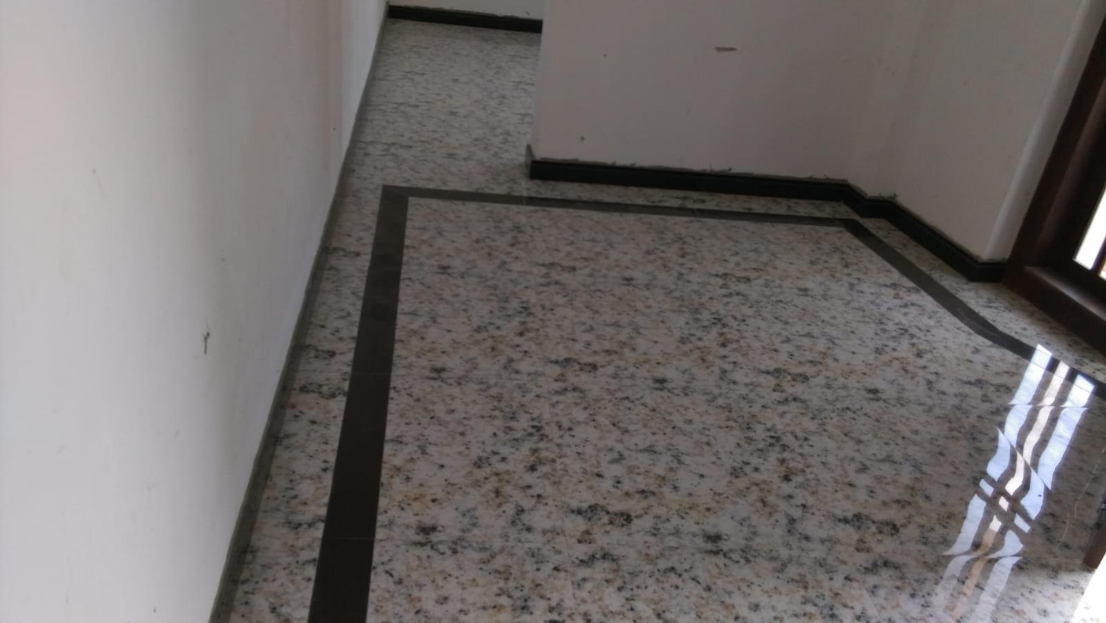 Polished granite classroom flooring completed during the Al Murshid school renovation